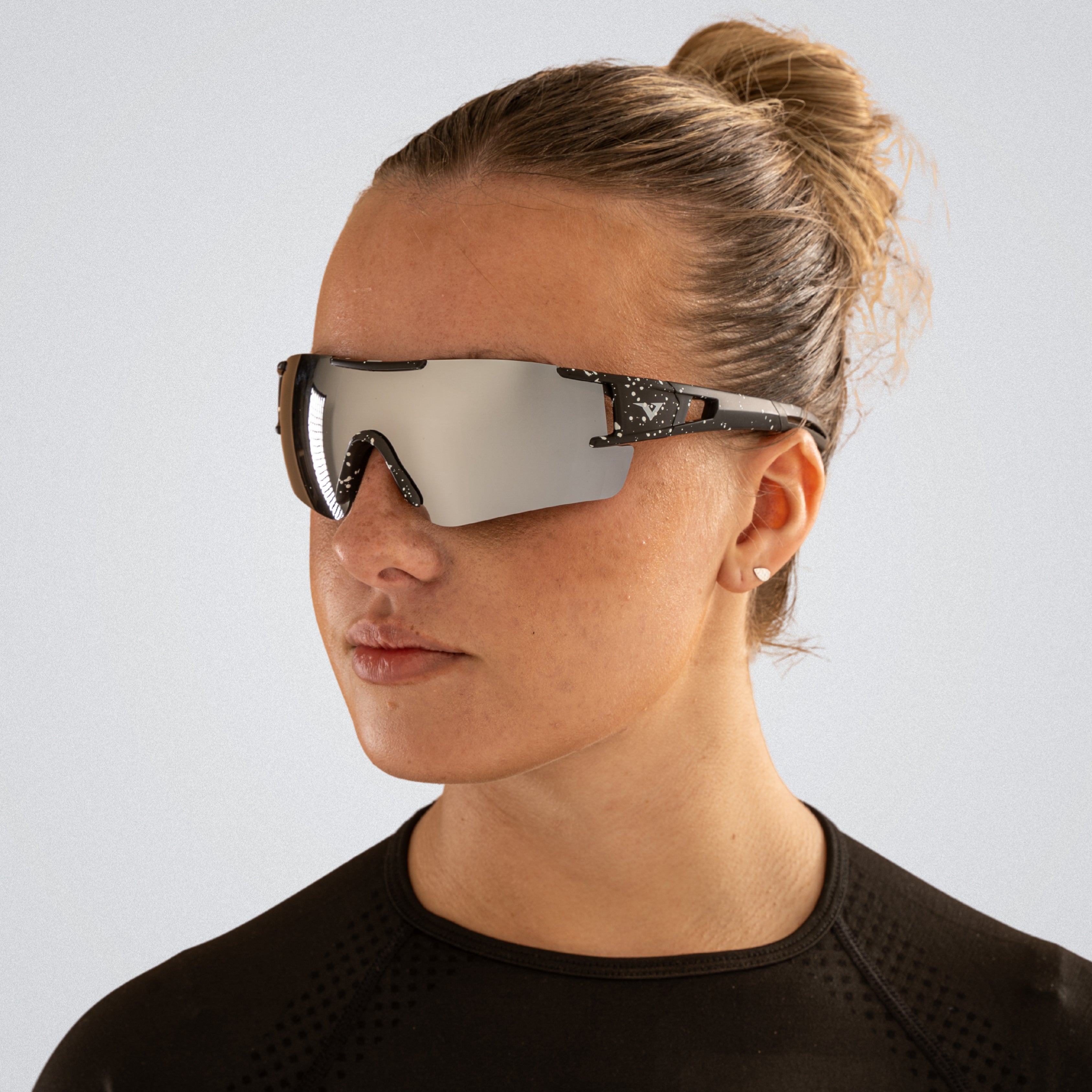 Velocity lightweight polarized sunglasses on a female models face